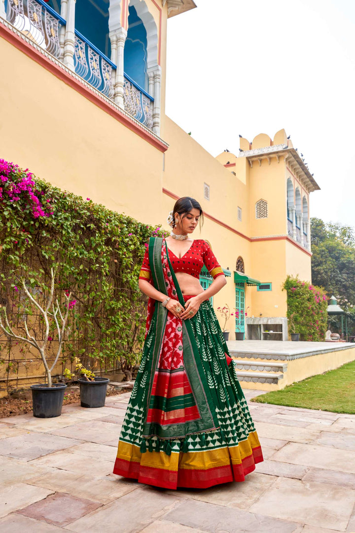 Traditional green with red tussar silk print with foil work lehenga set - PAHRAVA