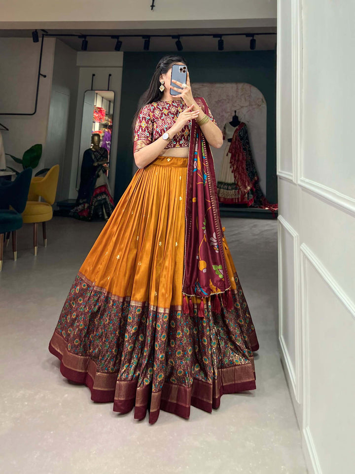 Mustard Orange Tussar Silk Lehenga set with Timeless Prints - PAHRAVA