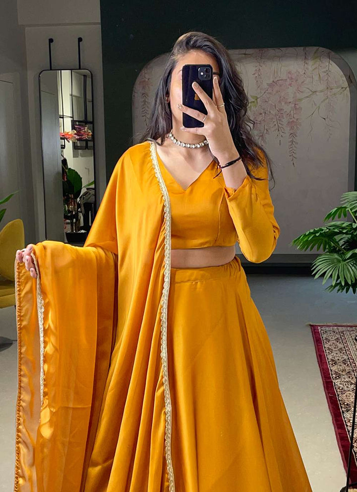 Tangy Orange Rangoli Silk Lehenga Set - PAHRAVA