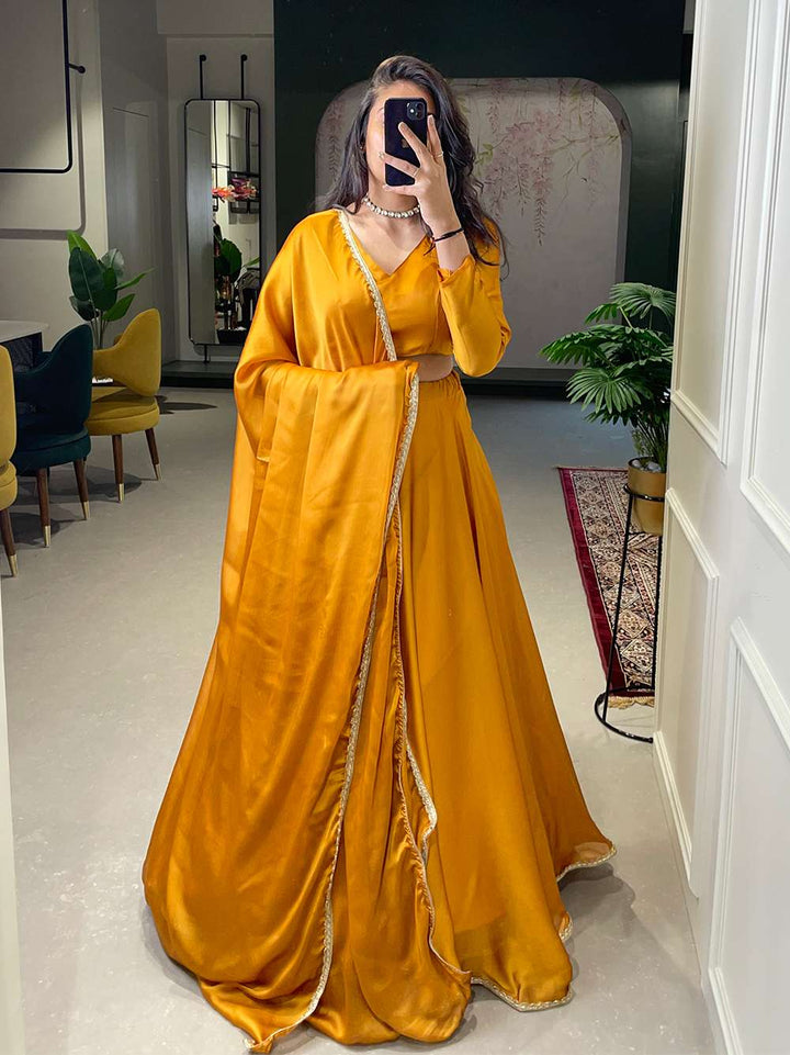 Tangy Orange Rangoli Silk Lehenga Set - PAHRAVA