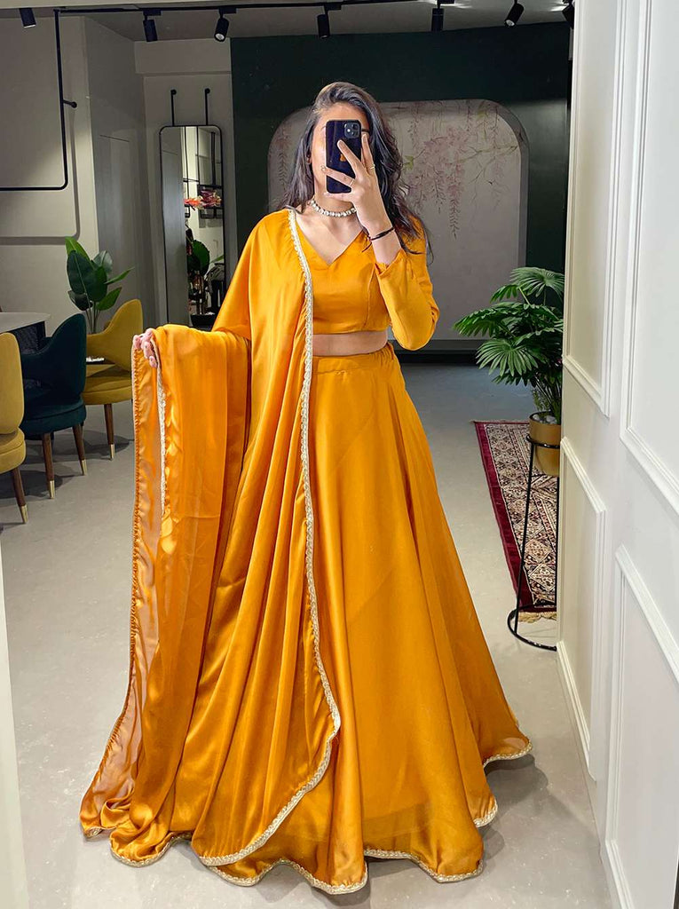 Tangy Orange Rangoli Silk Lehenga Set - PAHRAVA