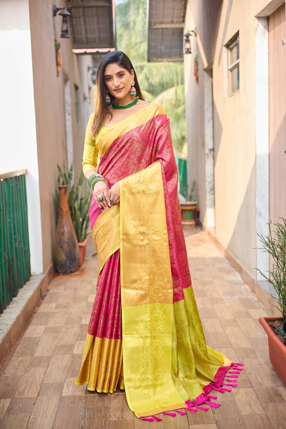 Yellow with pink saree with vibrant tassels - PAHRAVA