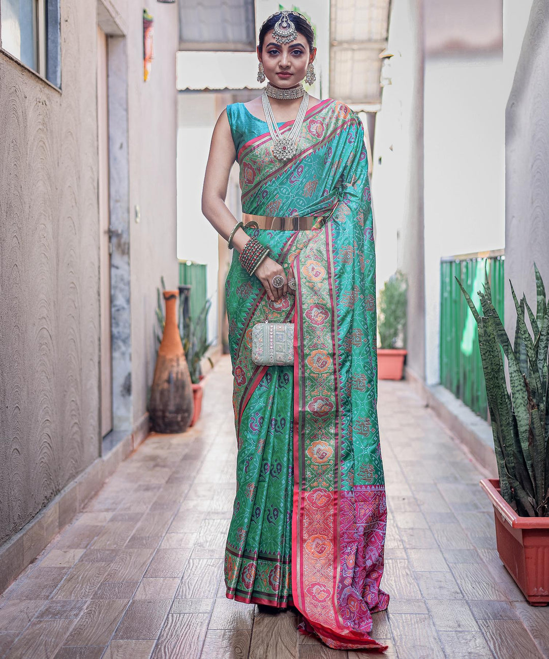 Teal Green Soft Patola Silk Saree - PAHRAVA