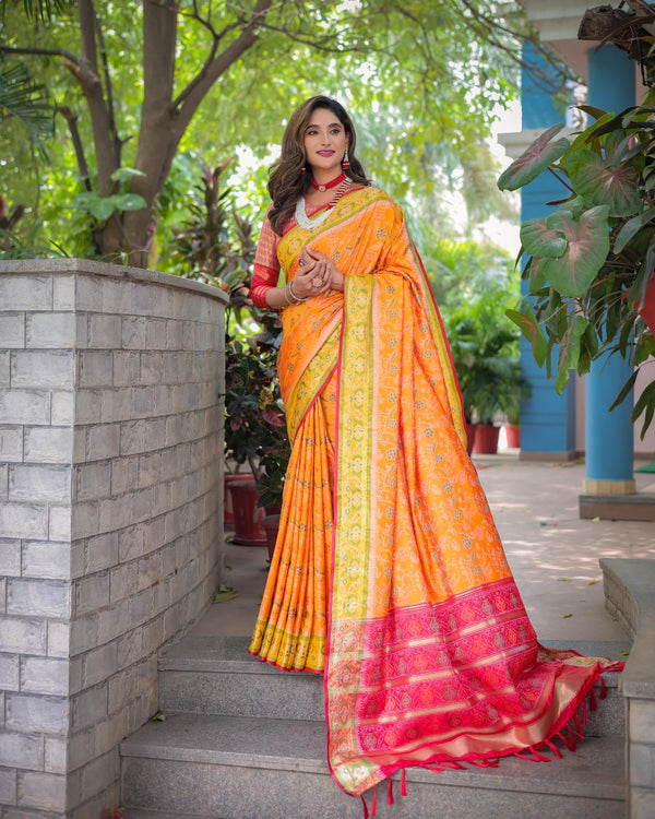 Orange Soft Patola Silk Saree with Rich Pallu.