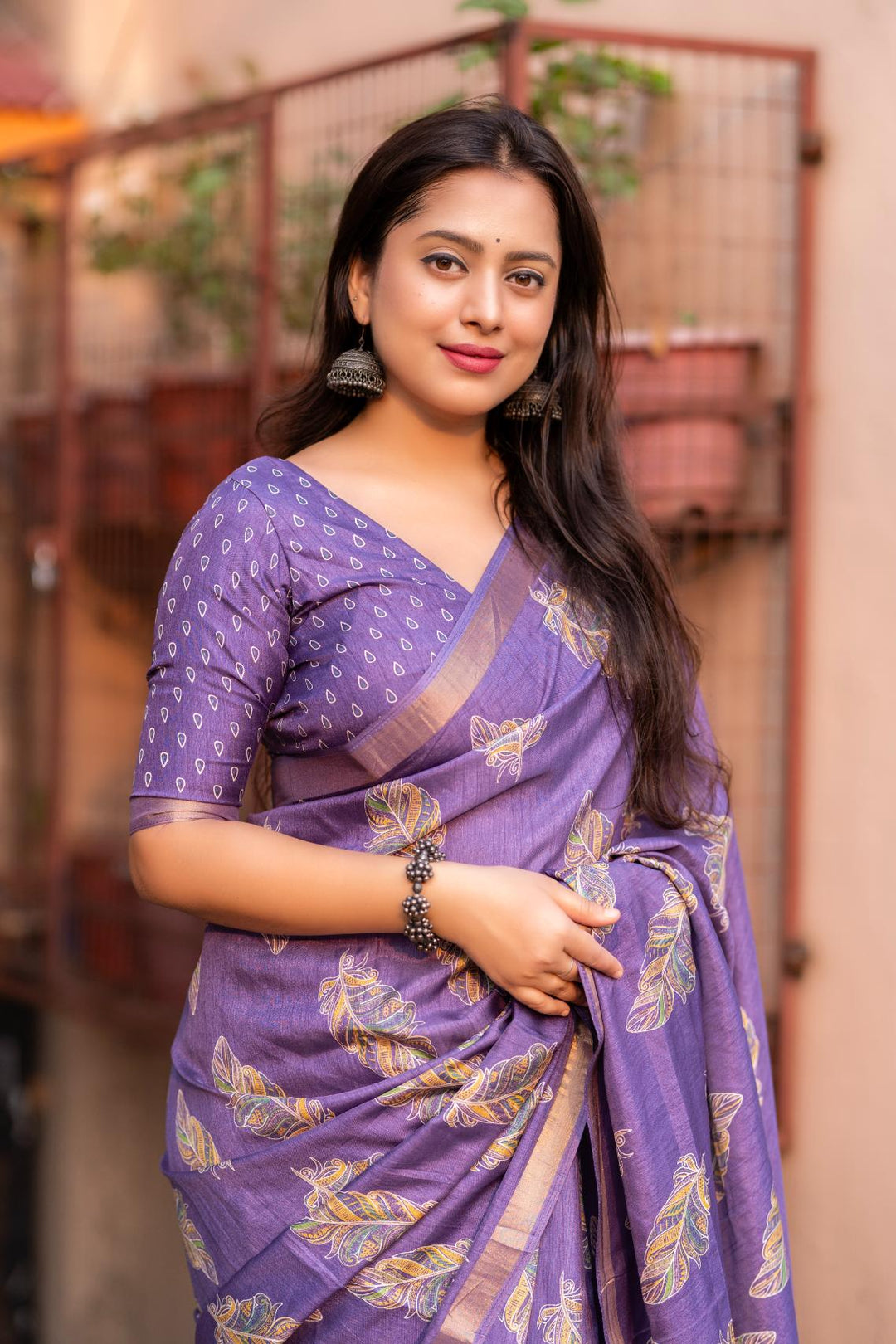 Pale Purple soft crape with Zari Pattu border saree.