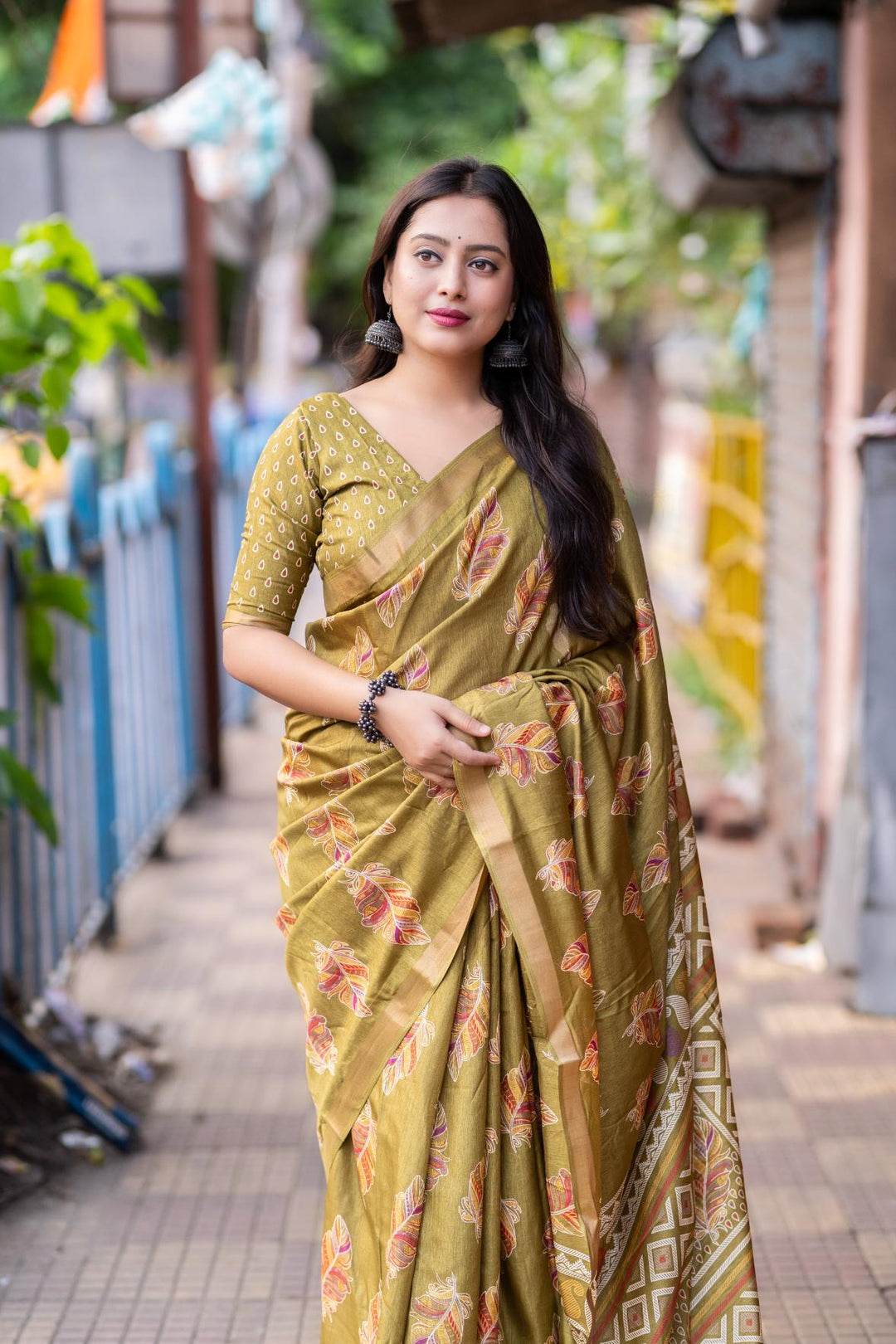 Luxor Gold soft crape with Zari Pattu border saree.