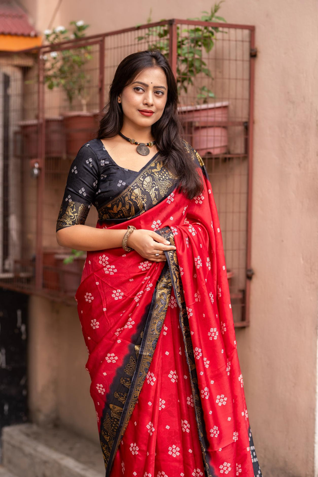 Traditional Red soft crape type self-woven smooth fabric with figure woven design border saree.