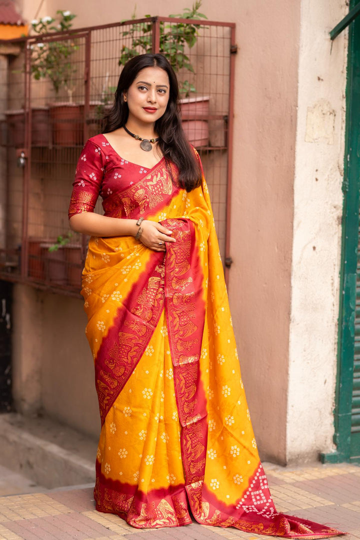 Mustard Yellow soft crape type self-woven smooth fabric with figure woven design border saree.