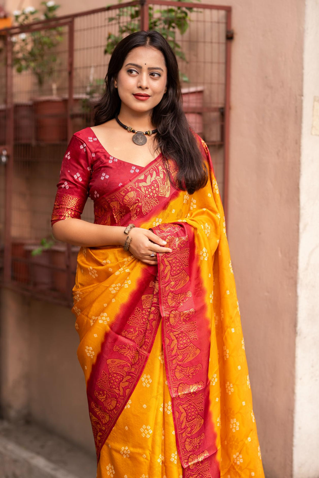 Mustard Yellow soft crape type self-woven smooth fabric with figure woven design border saree.