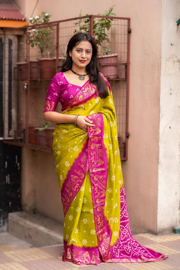 Olive Green soft crape type self-woven smooth fabric with figure woven design border saree.