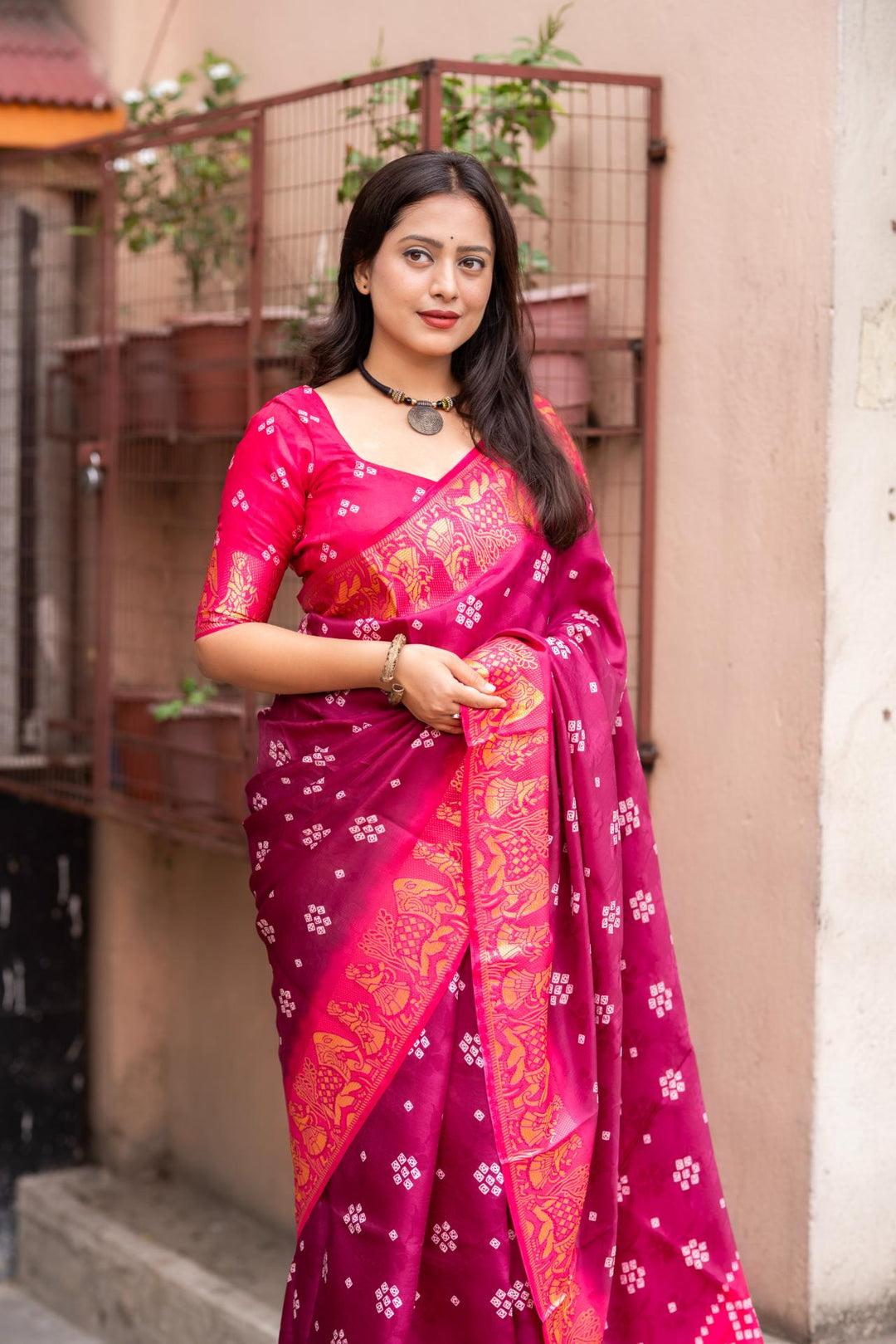 Dark Pink soft crape type self-woven smooth fabric with figure woven design border  saree.