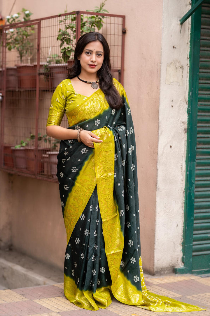 Dark Green soft crape type self-woven smooth fabric with figure woven design border saree.