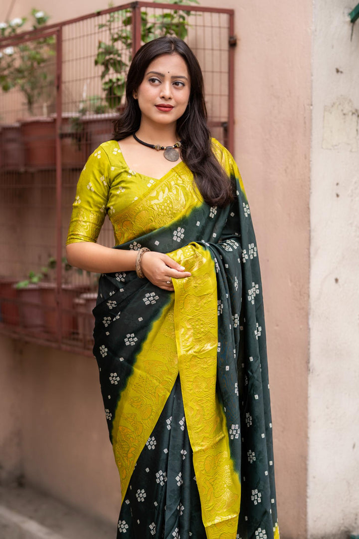 Dark Green soft crape type self-woven smooth fabric with figure woven design border saree.