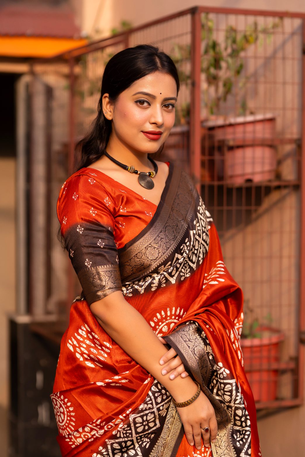 Sunrise Orange soft cotton cape with Jacq Zari woven border saree.