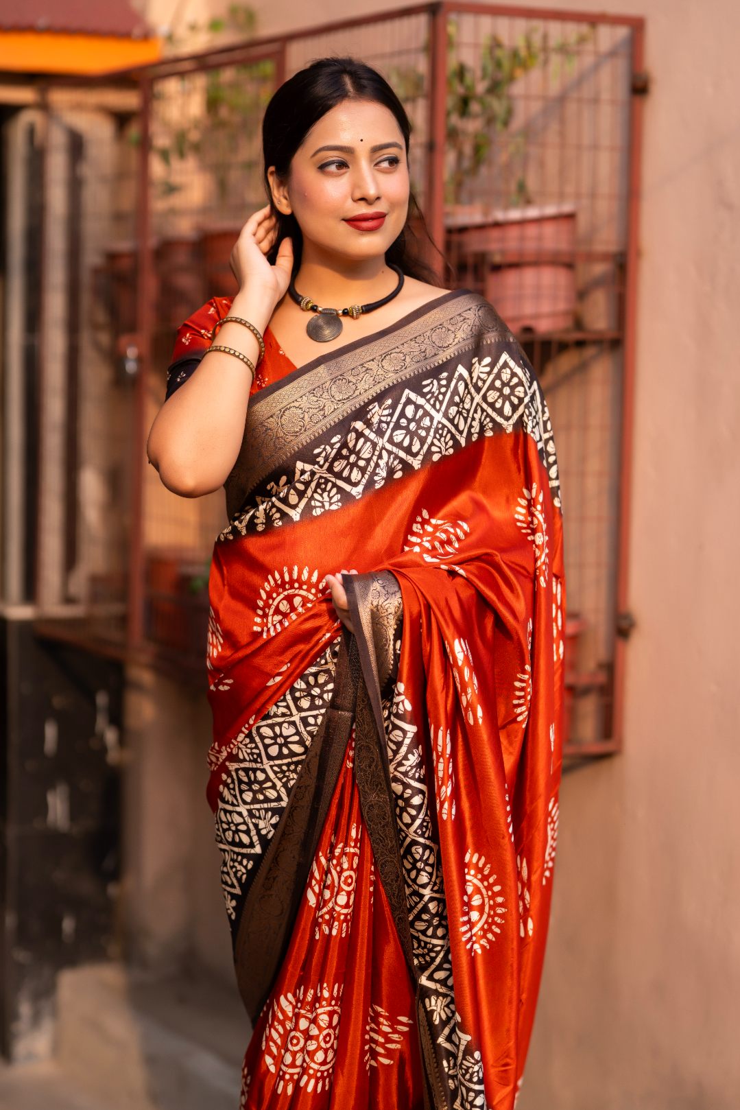 Sunrise Orange soft cotton cape with Jacq Zari woven border saree.