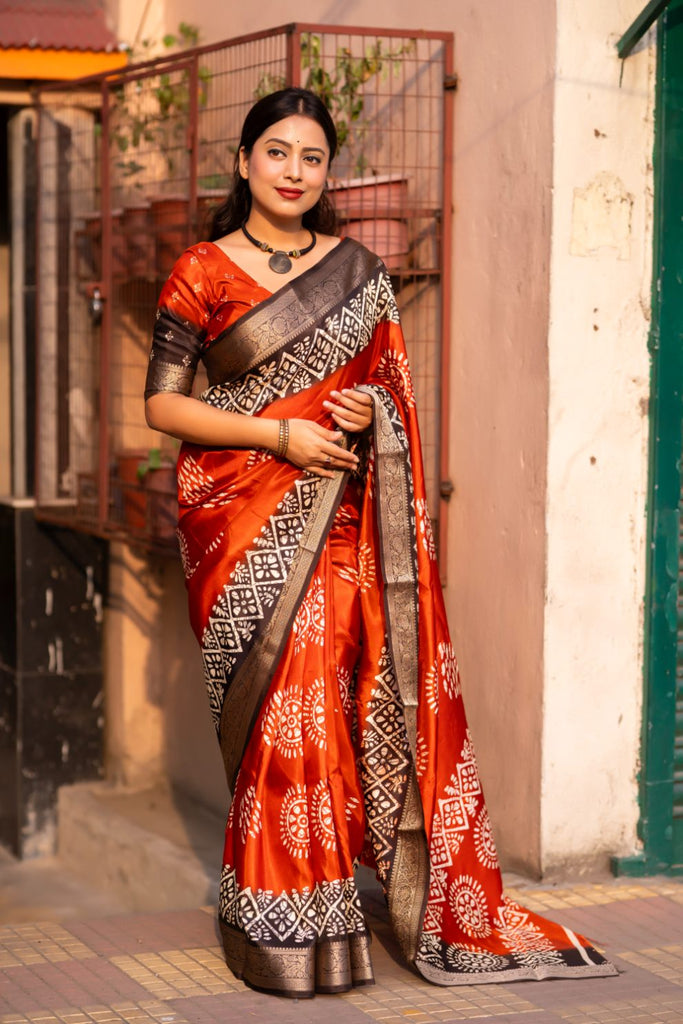 Sunrise Orange soft cotton cape with Jacq Zari woven border saree.