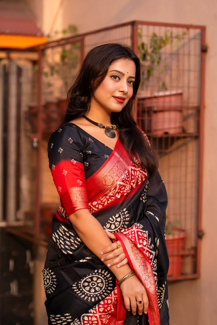 Black And Red soft cotton cape with Jacq Zari woven border saree.