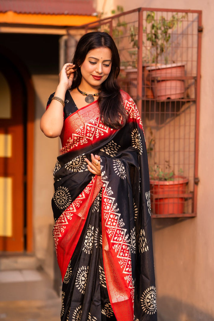 Black And Red soft cotton cape with Jacq Zari woven border saree.