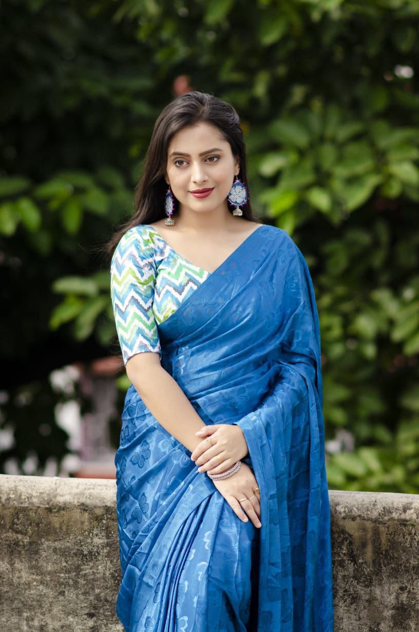 Prussian Blue soft turkey silk saree with allover simple shine woven butterfly.