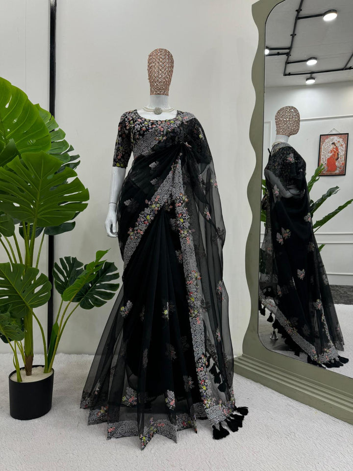 Bold Black Tibby silk and Tassels with Thread work saree