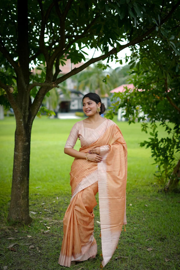 Light Orange Checks Printed Tussar Silk Saree.