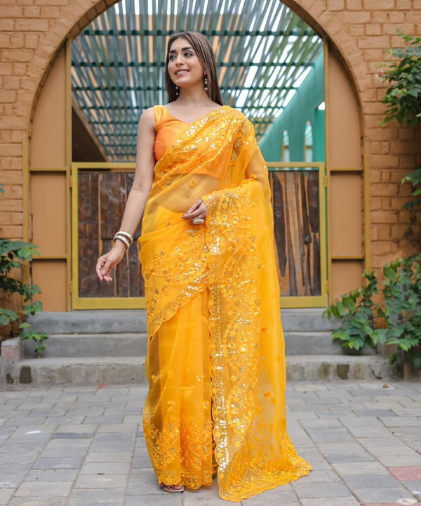 Saffron Yellow Shiny Fabric Organza Silk Saree.