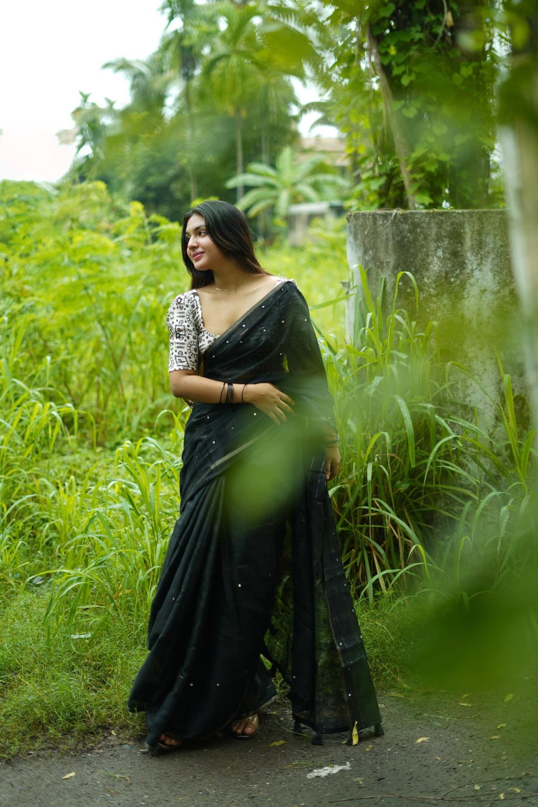 Jet Black Soft Linen Chex With Aari Mirror Work Saree.