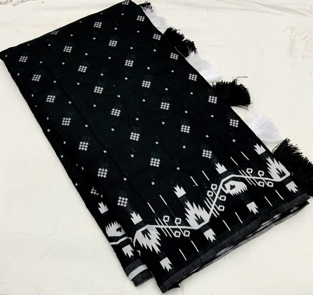 Bold Black soft cotton silk with Ikka style silver Zari woven design saree.