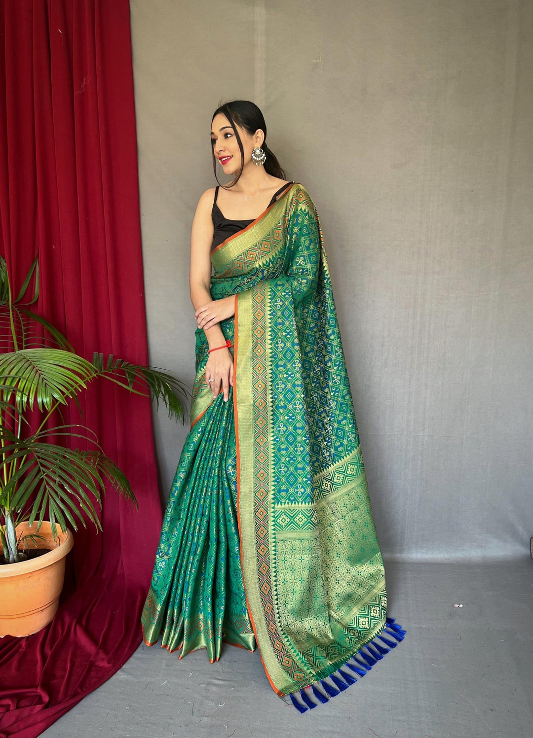 Teal Green Patola Weaving Silk Saree - PAHRAVA