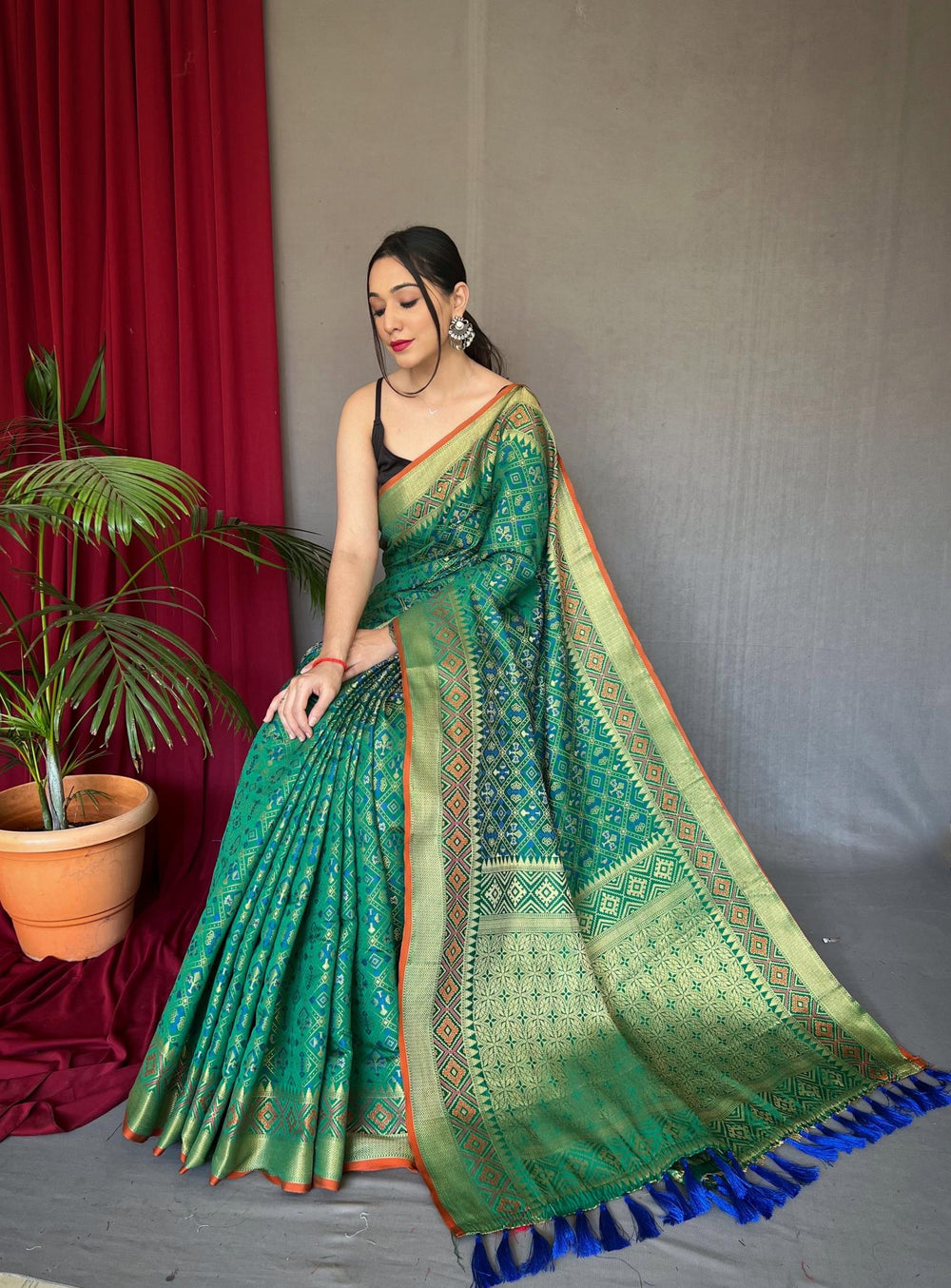 Teal Green Patola Weaving Silk Saree - PAHRAVA