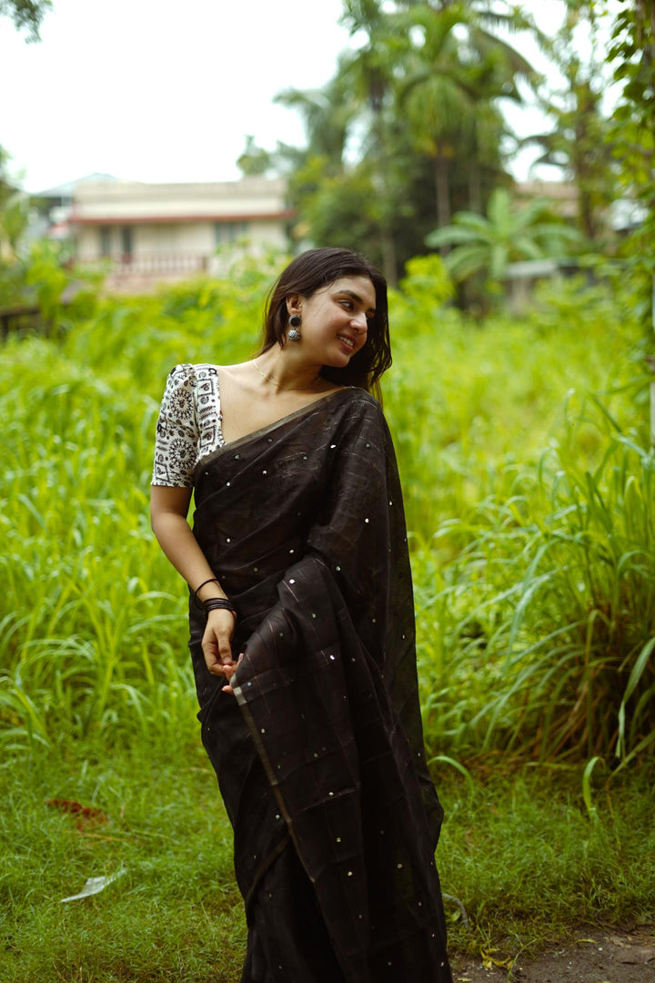 Jet Black Soft Linen Chex With Aari Mirror Work Saree.