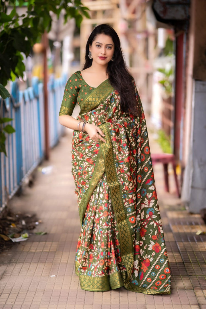 Olive Green soft slub silk kalamkari printed with Jacq woven Zari border saree.