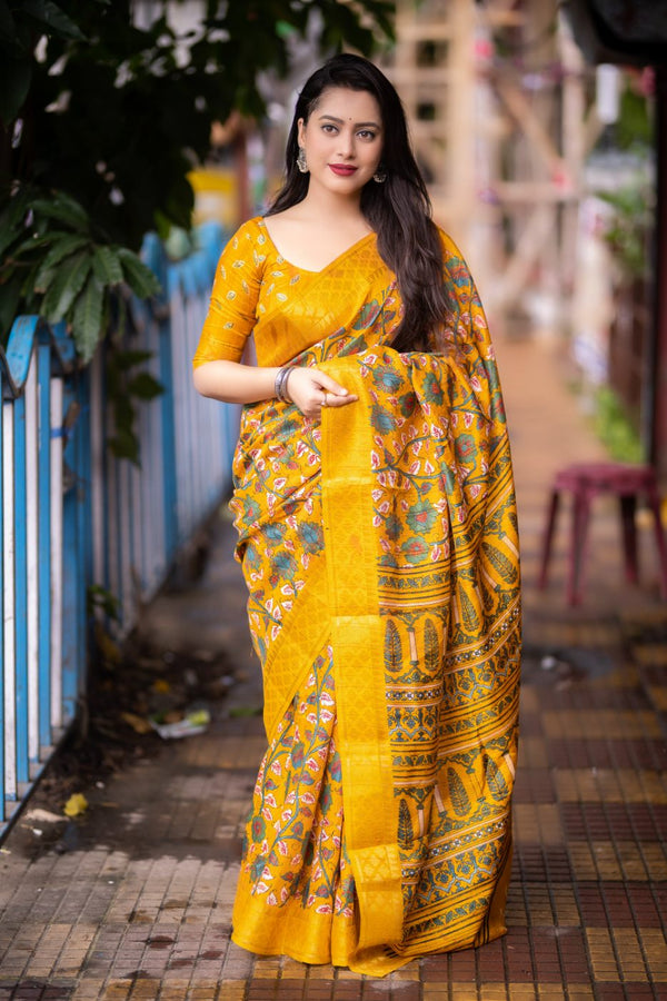 Warm Yellow soft slub silk kalamkari printed with Jacq woven Zari border saree.