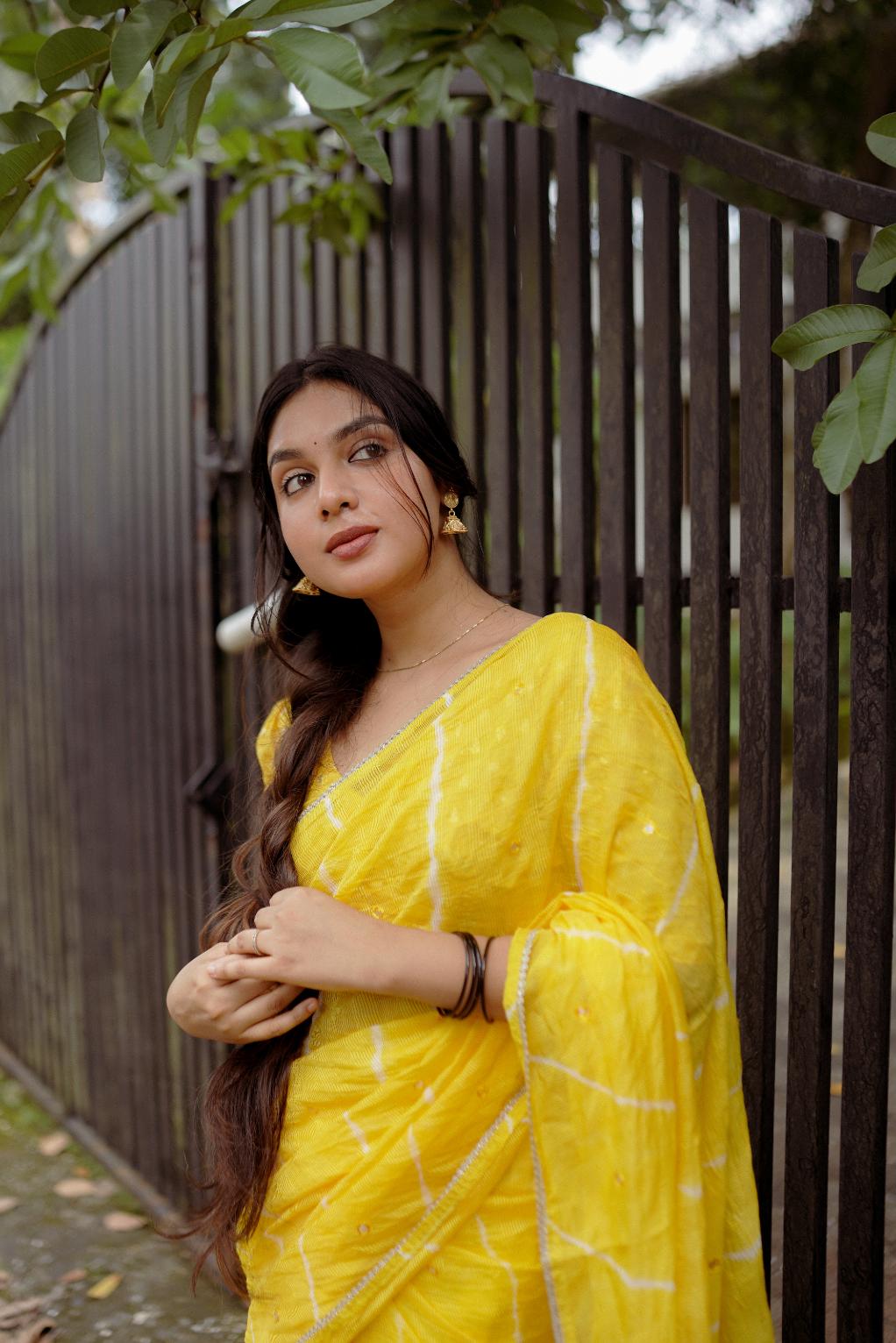 Sunshine Yellow pure Kota saree with tye and dye leheriya.