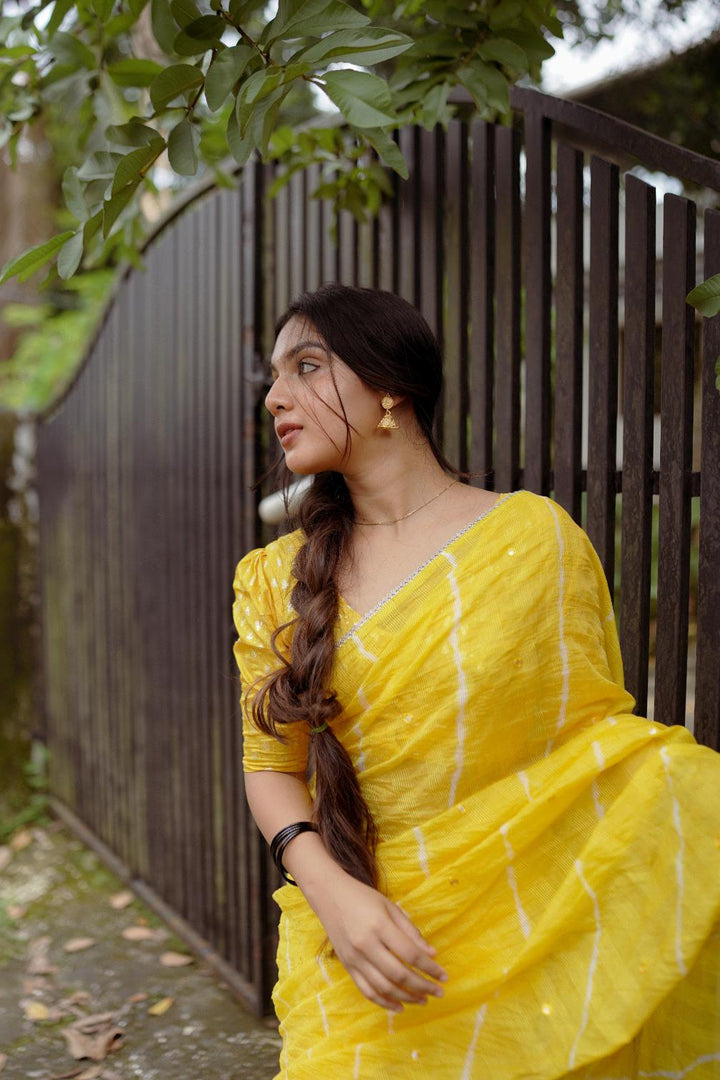 Sunshine Yellow pure Kota saree with tye and dye leheriya.