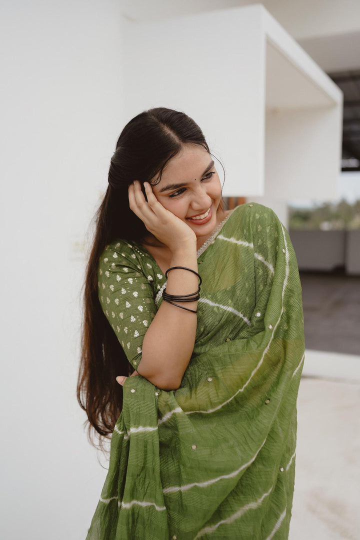 Leaf Green pure Kota saree with tye and dye leheriya.